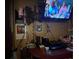 Small living area with TV, desk, and decorations at 1983 Abrico Dr # H-9, Lutz, FL 33558