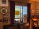 Window with natural light and burgundy colored curtains inside of home at 1983 Abrico Dr # H-9, Lutz, FL 33558