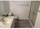 Modern bathroom featuring a single vanity with a shower at 20720 Eustis Rd, Land O Lakes, FL 34637