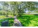 A well-maintained dog park with walking path and benches, offering a community space for dog owners at 20720 Eustis Rd, Land O Lakes, FL 34637