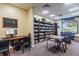 The library has computer, ample bookshelves, seating, and natural light for a tranquil reading experience at 20720 Eustis Rd, Land O Lakes, FL 34637