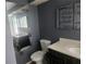Bathroom featuring vanity, mirror and toilet at 2083 Envoy Ct, Clearwater, FL 33764