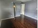Cozy bedroom with hardwood floors, offering a comfortable retreat at 2083 Envoy Ct, Clearwater, FL 33764