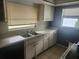 Functional kitchen with a sink and countertops at 2083 Envoy Ct, Clearwater, FL 33764