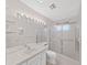 Clean bathroom with dual sinks, a spacious shower, and plenty of counter space at 2402 Ecuadorian Way # 40, Clearwater, FL 33763