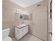 Bathroom with vanity, tile flooring and shower tub combination at 2402 Ecuadorian Way # 40, Clearwater, FL 33763