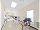 Brightly lit computer room featuring desks, computers, and ample workspace at 2402 Ecuadorian Way # 40, Clearwater, FL 33763