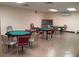 Recreation room with tables for playing games, offering a social space for residents to enjoy at 2402 Ecuadorian Way # 40, Clearwater, FL 33763
