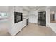 Spacious kitchen with a built-in oven, white cabinetry, and modern appliances at 2402 Ecuadorian Way # 40, Clearwater, FL 33763