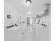Well-lit laundry room with multiple washing machines and clean, white interiors at 2402 Ecuadorian Way # 40, Clearwater, FL 33763