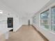 This home has a bright living area with tile floors, a kitchen, and windows for great natural light at 2402 Ecuadorian Way # 40, Clearwater, FL 33763