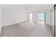Spacious main bedroom featuring great natural light, a fan, and closet storage at 2402 Ecuadorian Way # 40, Clearwater, FL 33763