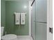 Bathroom with toilet and a glass door shower at 306 Martha Ln # 42, Oldsmar, FL 34677