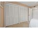 Bedroom with carpet and closets at 306 Martha Ln # 42, Oldsmar, FL 34677