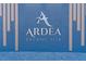 Detailed shot of the Ardea Country Club sign with stone and wood accents at 306 Martha Ln # 42, Oldsmar, FL 34677