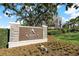 Close-up of Ardea Country Club sign surrounded by manicured landscape at 306 Martha Ln # 42, Oldsmar, FL 34677