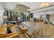 A comfortable lobby with a large open window, natural light, comfortable seating, and a reception desk at 306 Martha Ln # 42, Oldsmar, FL 34677