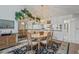 Bright dining space features a decorative mirror wall with views into the kitchen and open living space at 3274 Lori Ln # 2, New Port Richey, FL 34655