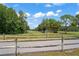 Picturesque golf course view with a fountain and lush greenery at 3274 Lori Ln # 2, New Port Richey, FL 34655