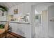 Kitchen and dining space with stainless steel appliances and ample counter space with natural light at 3274 Lori Ln # 2, New Port Richey, FL 34655