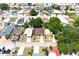 Aerial view of the neighborhood with various homes and tree coverage at 3315 W Saint John St, Tampa, FL 33607