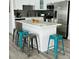 Stylish kitchen featuring a kitchen island with bar stool seating at 3315 W Saint John St, Tampa, FL 33607