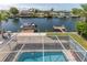 Overhead view of pool and dock along waterfront community at 3352 Gulfview Dr, Hernando Beach, FL 34607