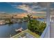 Waterfront backyard view with dock, canal access, and a picturesque horizon at 3352 Gulfview Dr, Hernando Beach, FL 34607