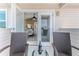 Balcony with seating overlooking the interior of home at 3352 Gulfview Dr, Hernando Beach, FL 34607