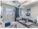 Bright bathroom with shower-tub combination, granite countertop, and vanity at 3352 Gulfview Dr, Hernando Beach, FL 34607