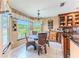 Cozy breakfast nook near the kitchen boasts natural light and casual dining at 3352 Gulfview Dr, Hernando Beach, FL 34607