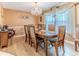 Formal dining room with elegant chandelier and large window provides natural light at 3352 Gulfview Dr, Hernando Beach, FL 34607