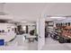 Large and organized garage with storage cabinets and work table at 3352 Gulfview Dr, Hernando Beach, FL 34607