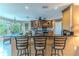 Kitchen with breakfast bar and wood cabinetry offers functionality and style at 3352 Gulfview Dr, Hernando Beach, FL 34607