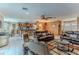 Open concept living space connecting the kitchen, dining area, and living room for seamless entertaining at 3352 Gulfview Dr, Hernando Beach, FL 34607