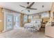 Bright main bedroom with balcony access and comfortable carpeting at 3352 Gulfview Dr, Hernando Beach, FL 34607