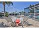 Inviting patio with comfortable lounge chairs and direct access to waterfront at 3352 Gulfview Dr, Hernando Beach, FL 34607