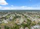 Scenic aerial view of the residential community, highlighting the tree-lined streets and the neighborhood layout at 3400 Rosebay Ct, Spring Hill, FL 34609