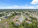Community aerial showcasing lush landscape, blue skies, and a peaceful residential neighborhood at 3400 Rosebay Ct, Spring Hill, FL 34609