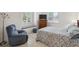 Bedroom featuring a window seat beneath plantation shutters at 3400 Rosebay Ct, Spring Hill, FL 34609