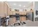 Functional kitchen featuring stainless steel appliances, modern finishes, and ample countertop space for easy meal prep at 3400 Rosebay Ct, Spring Hill, FL 34609
