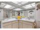 Bathroom featuring double sinks, lots of counter space, and a walk-in shower at 3544 Teeside Dr # 1, New Port Richey, FL 34655