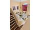 Bright foyer with soaring ceilings, pendant lighting, and decorative front door, offering a grand entrance at 4148 Landover Blvd, Spring Hill, FL 34609