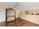 Spacious living room with wood floors, arched doorways, and natural light, perfect for relaxation at 4148 Landover Blvd, Spring Hill, FL 34609
