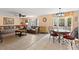 Spacious living room featuring modern floors and an elegant dining area at 4148 Landover Blvd, Spring Hill, FL 34609