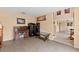 Home office space and living room with modern flooring at 4148 Landover Blvd, Spring Hill, FL 34609