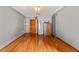Neutral bedroom with hardwood floors, closet, and ceiling fan at 4190 Lema Dr, Spring Hill, FL 34609