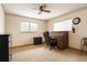 Bedroom featuring a ceiling fan, floral wallpaper trim and a roll top desk at 4190 Lema Dr, Spring Hill, FL 34609