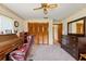 A comfortable bedroom with a large closet and classic wood dresser at 4190 Lema Dr, Spring Hill, FL 34609