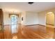 Spacious living room with hardwood floors and sliding glass doors for natural light at 4190 Lema Dr, Spring Hill, FL 34609